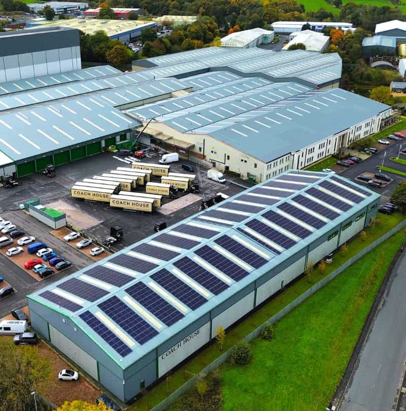 Ariel drone shot of solar panels on Coach House